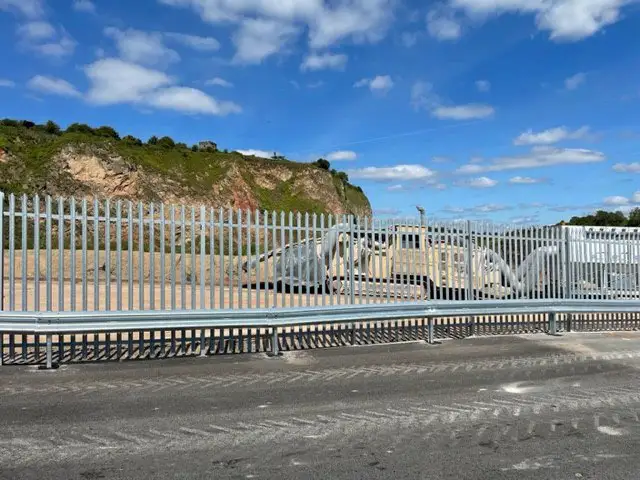 PALISADE FENCING WITH ARMCO BARRIER: Swipe To View More Images